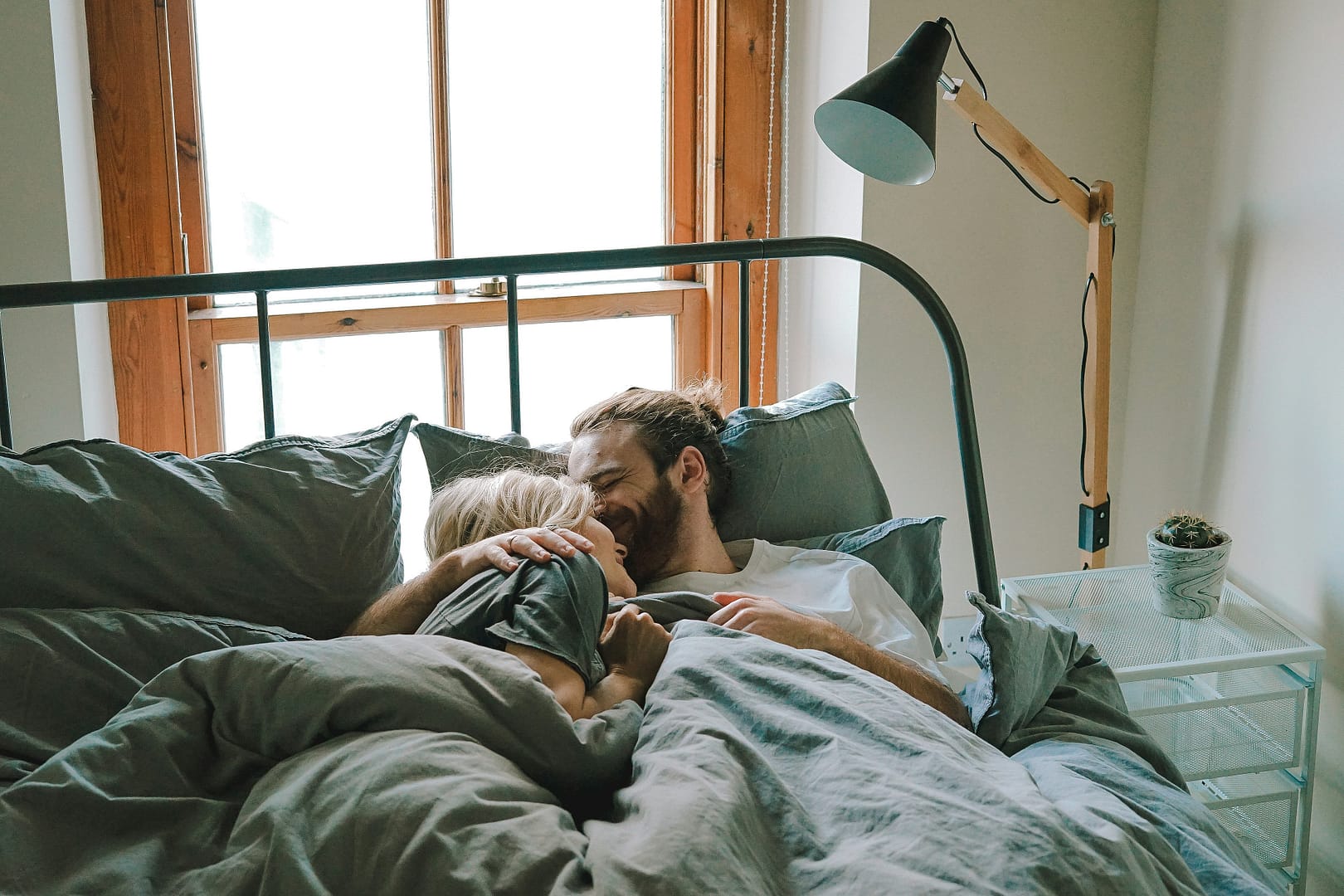 Couple in bed Couple lounging in bed