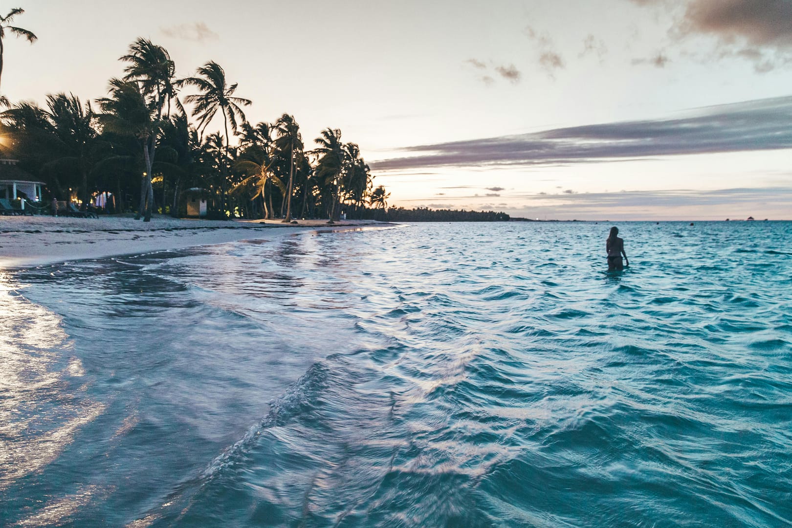 Punta-Cana Women standing in the water off the coast of Punta Cana
