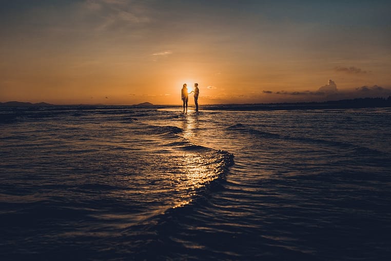 beach-7087722_1280 Couple walking on the beach at sunet while on a vacation that supports their love languages.