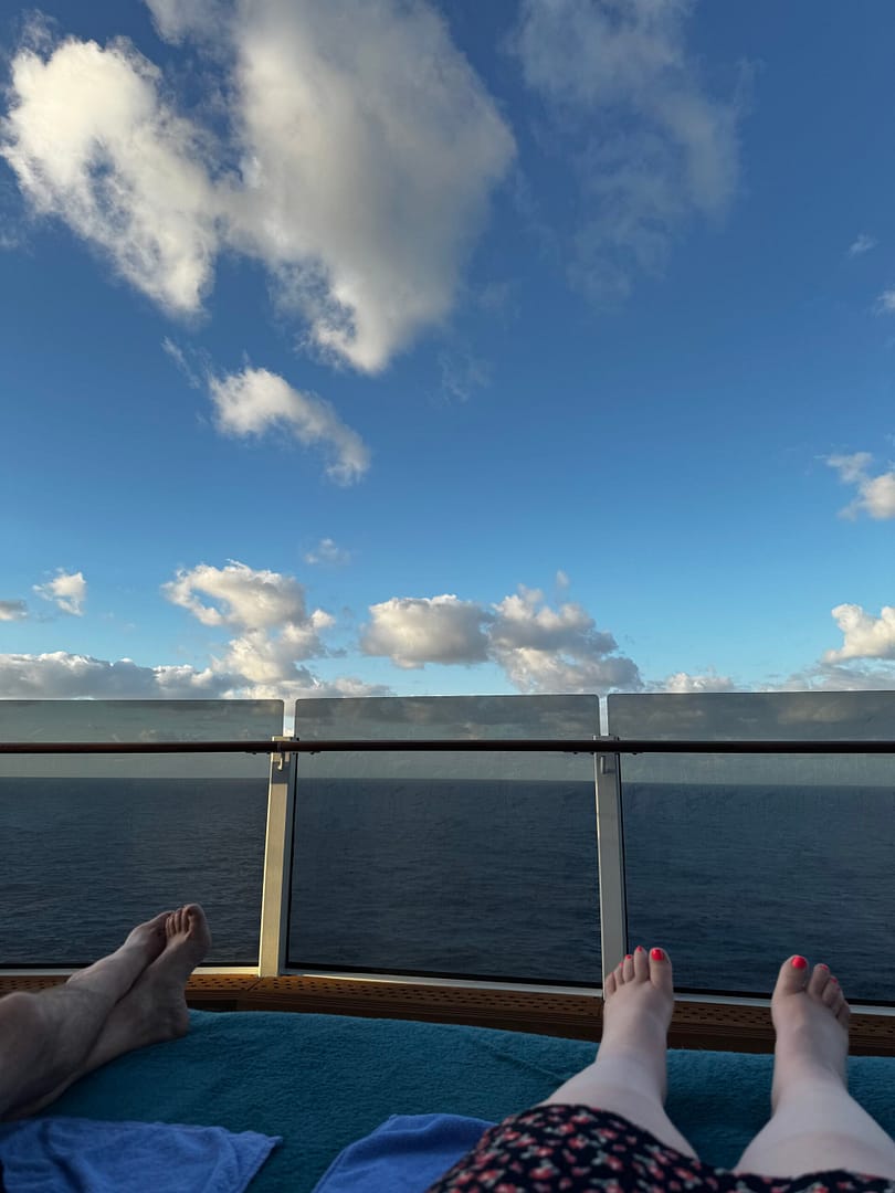 View of the ocean from a lounge chair during a couples cruise